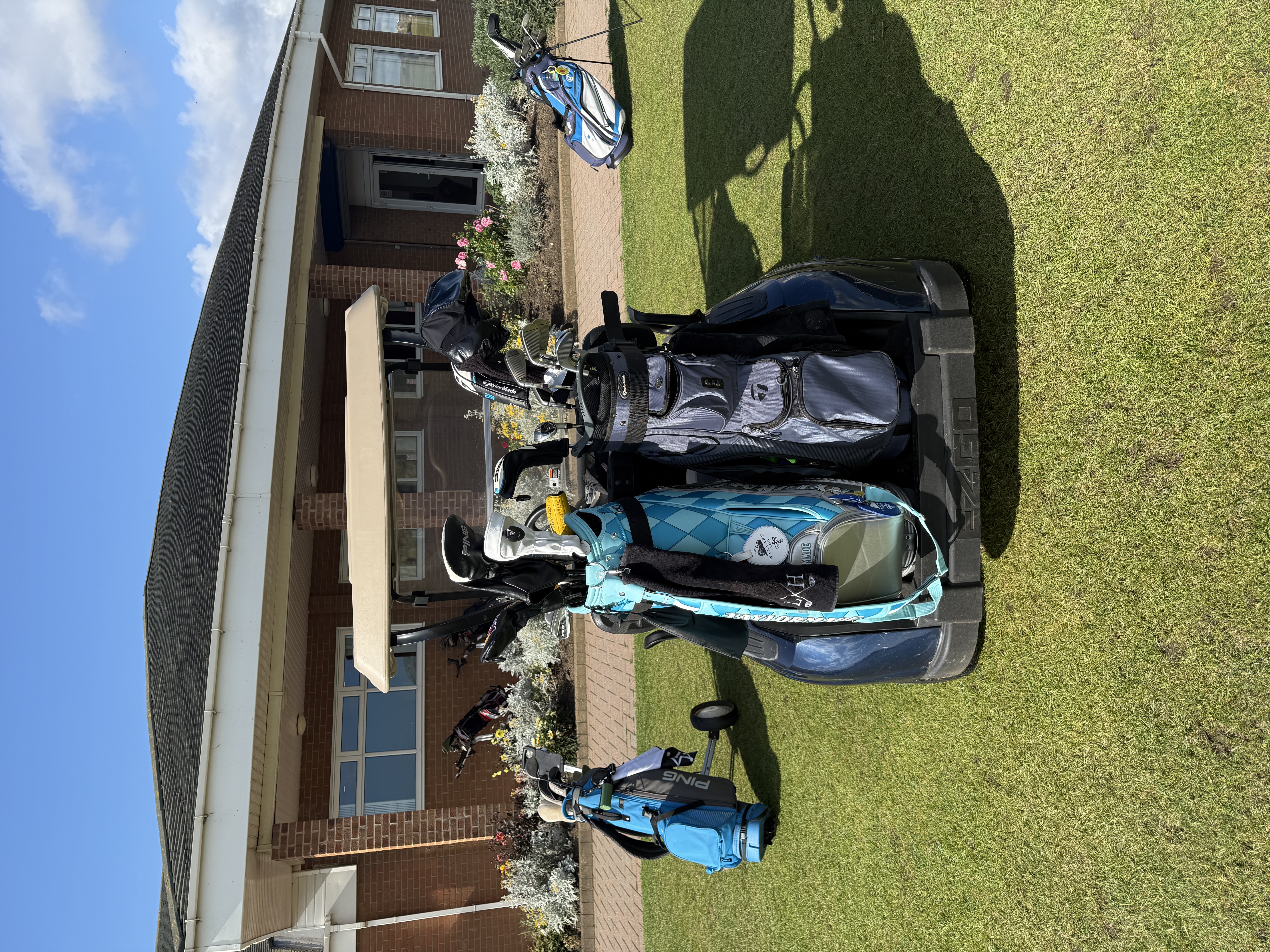 Golf bags lined up at the clubhouse — Miles For Men Charity Golf Day
