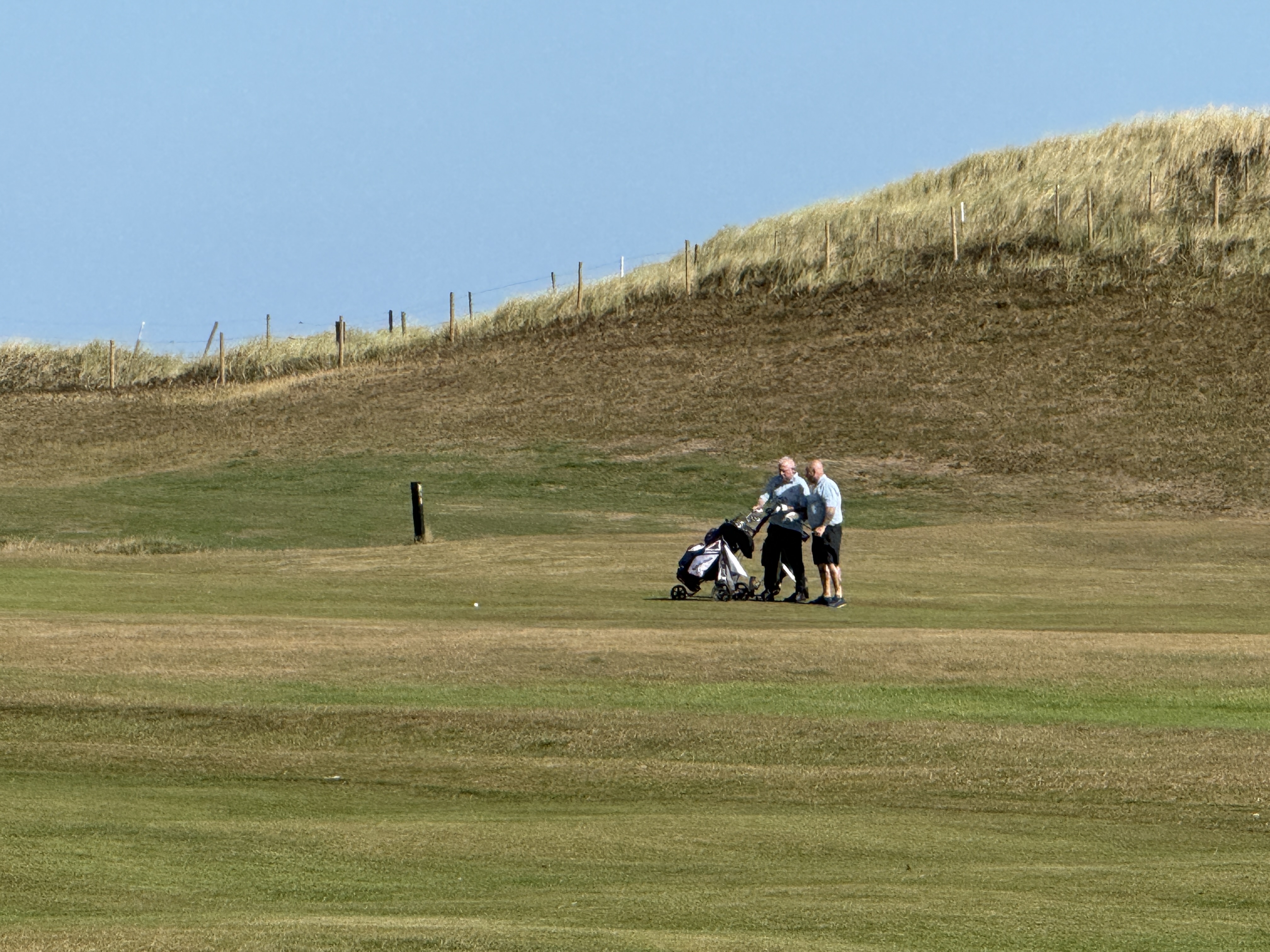 Players walking the fairway — Miles For Men Charity Golf Day
